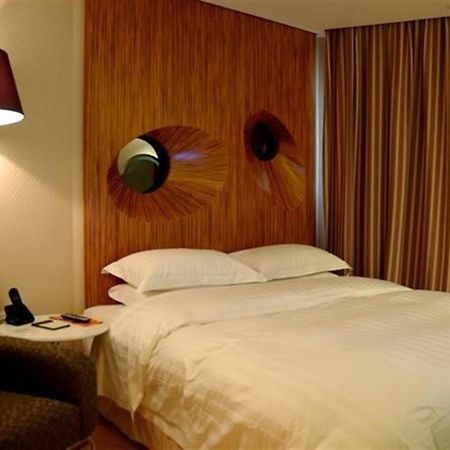 Brook Hotel Hangzhou Værelse billede